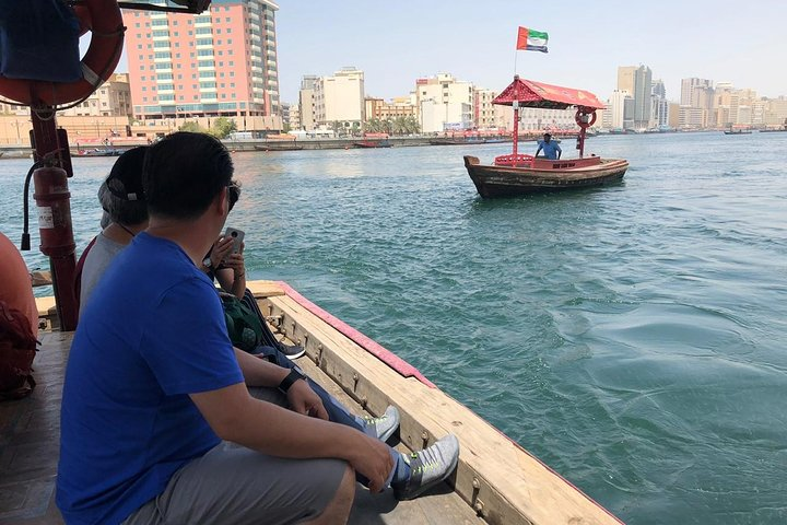 Breathe in the rich history while gliding through Dubai Creek where traditional abra rides offer stunning views of both modern skyscrapers and charming historic neighborhoods blending past and present seamlessly.